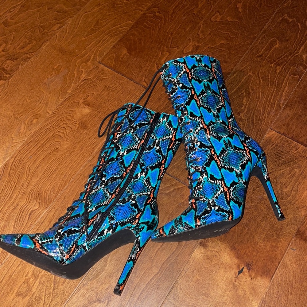 Snake print lace up boots